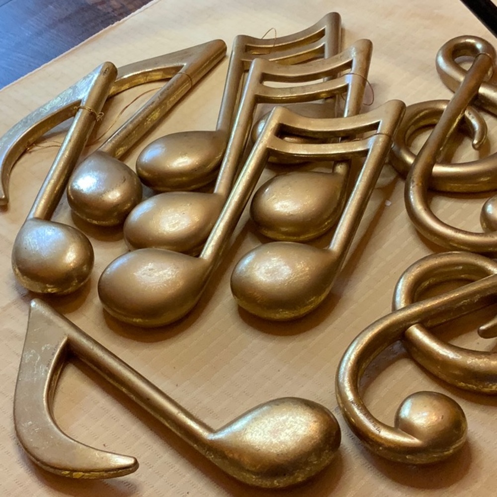Musical notes in gold leaf